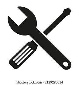 Tool icon. Wrench and screwdriver on a white background. Vector graphic illustration.