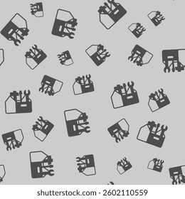 Toolbox with hammer, screwdriver and wrench solid seamless pattern, repair service theme. Vector graphics. Repair tools box sign background, filled with glyphs icon