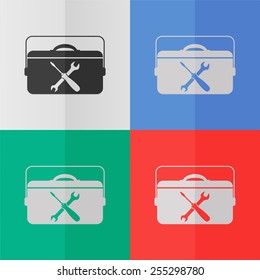 Toolbox vector icon. Effect of folded paper. Colored (red, blue, green) illustrations. Flat design