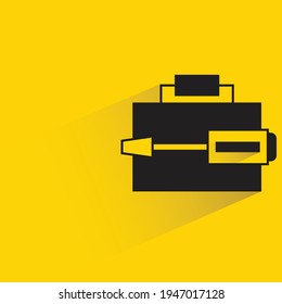 toolbox and wrench with shadow on yellow background