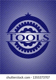Tools badge with denim background