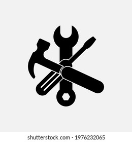Tools of black color. Vector Wrench, screwdriver and hammer icon on white background