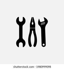 Herramientas de color negro. Llave vectorial, destornillador e icono de martillo en fondo blanco