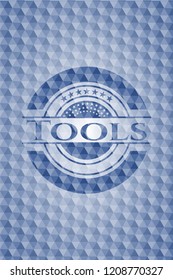 Tools blue badge with geometric pattern background.
