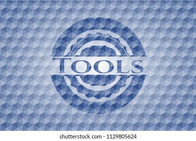 Tools blue emblem with geometric background.