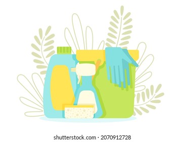Tools for cleaning the house on the background of leaves and plants.