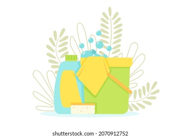 Tools for cleaning the house on the background of leaves and plants.. 