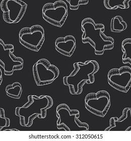 Tools for cookies, baking cookies. Cookie cutters drawn on the chalkboard. Seamless pattern. Vector illustration.