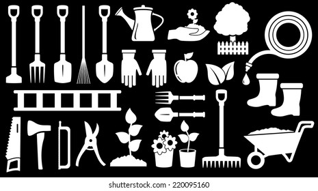 tools for gardening work on black background