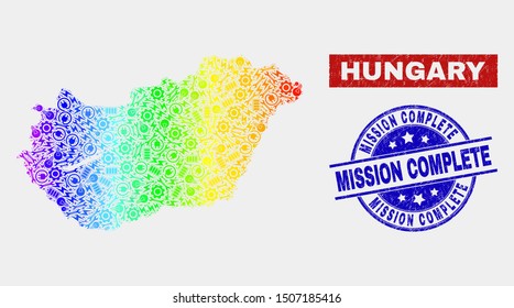 Tools Hungary map and blue Mission Complete scratched stamp. Colorful gradient vector Hungary map mosaic of production units. Blue round Mission Complete stamp.