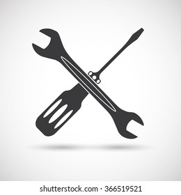 Tools icon. Screwdriver and wrench. Wrench and screwdriver vector icon isolated on white batskground