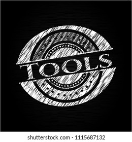 Tools on chalkboard