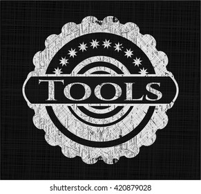 Tools on chalkboard