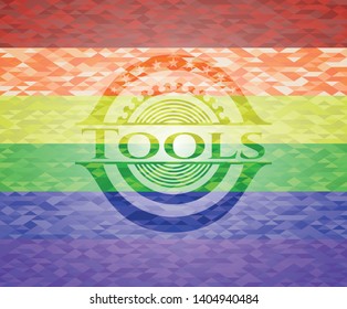 Tools on mosaic background with the colors of the LGBT flag