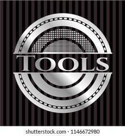 Tools silvery badge or emblem