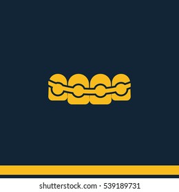 Tooth with braces icon.