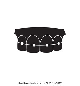 Tooth with braces icon. Simple black vector symbol. Logo for web. Image for business.
