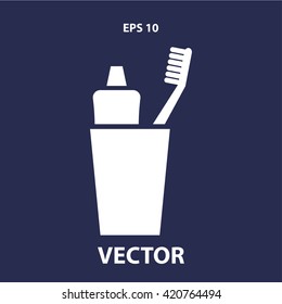 tooth brush with tooth paste in glass icon