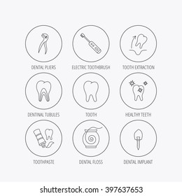 Tooth extraction, electric toothbrush icons. Dental implant, floss and dentinal tubules linear signs. Toothpaste icon. Linear colored in circle edge icons.