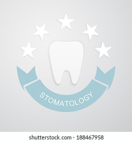 Tooth with five stars and ribbon labeled stomatology on gray background