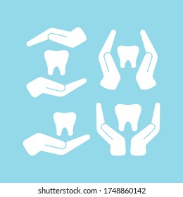 Tooth in hands white color vector icon set isolated on blue background. Dental care and dentist treatment concept. Flat simple design illustration for apps, logo and website. Hands holding teeth.