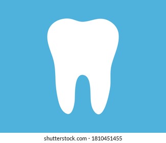 Tooth icon in flat style. Dental care concept. Medicine. White tooth on a blue background. Dental clinic symbol.