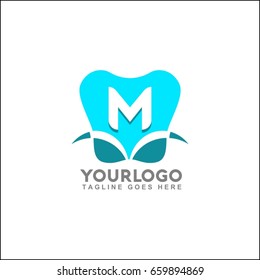 Tooth icon letter m logo design. Dental vector illustration. Letter M