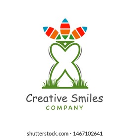 tooth logo design on grass