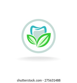Tooth logo. Fresh dent with green leaves symbol.