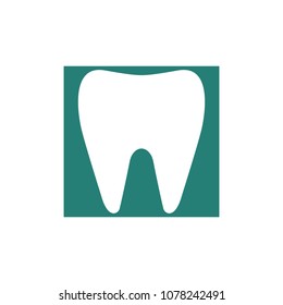 Tooth logo on green background. Healthy teeth concept