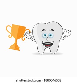 Tooth mascot character with a trophy in right hand. vector illustration
