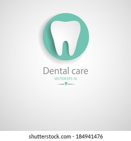 Tooth on the grey background.