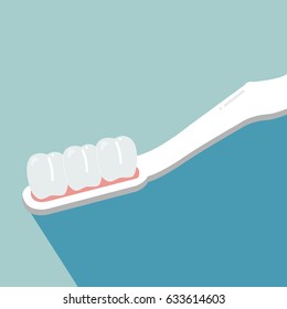 Tooth on toothbrush on background blue, concept dental