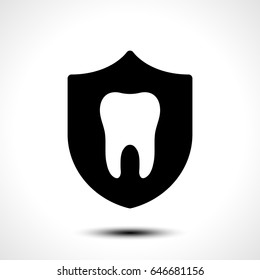 Tooth with protective shield on white background