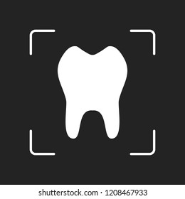 tooth. simple icon. White object in camera autofocus on dark background