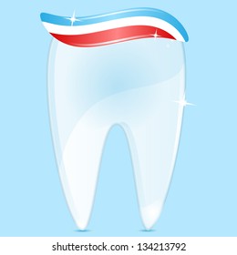 tooth of white color and tooth-paste