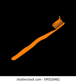 Toothbrush with applied toothpaste portion. Orange icon on black background.