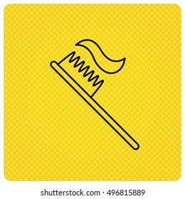 Toothbrush icon. Toothpaste sign. Dental oral cleaning symbol. Linear icon on orange background. Vector