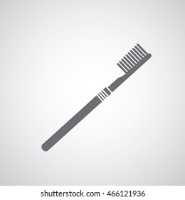 toothbrush symbol on gray background 