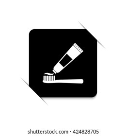 Toothbrush and toothpaste -  black vector icon