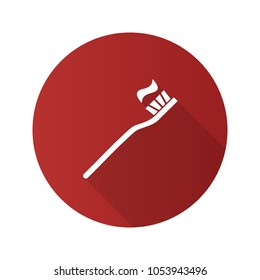Toothbrush with toothpaste flat design long shadow glyph icon. Dentifrice. Vector silhouette illustration
