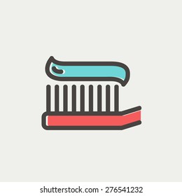 Toothbrush with toothpaste icon thin line for web and mobile, modern minimalistic flat design. Vector icon with dark grey outline and offset colour on light grey background.