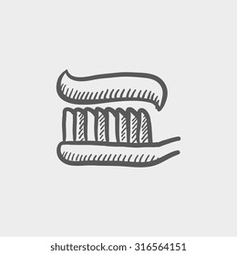 Pincel de dientes con icono de sketch de dentífrico para web, móvil e infografía. Icono de gris oscuro vector dibujado a mano aislado en fondo gris claro.