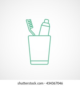 Toothpaste and Tooth Brush In Cup Green Line Icon On White Background