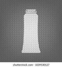 Toothpaste tube sign illustration. Vector. White knitted icon on gray knitted background. Isolated.