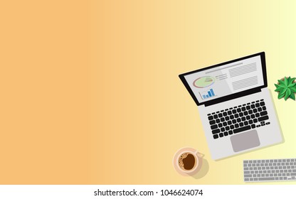 Top aerial View of business desk table with laptop and business graph on screen,a cup of coffee, notebook,wireless keyboard,small tree and copy space for text
