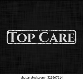 Top Care chalkboard emblem on black board