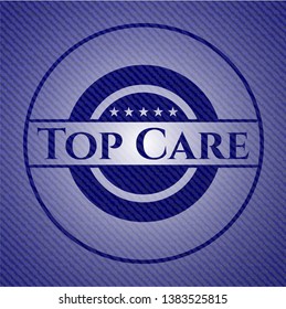 Top Care emblem with jean texture. Vector Illustration. Detailed.