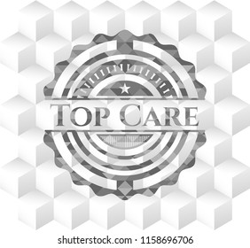 Top Care grey badge with geometric cube white background