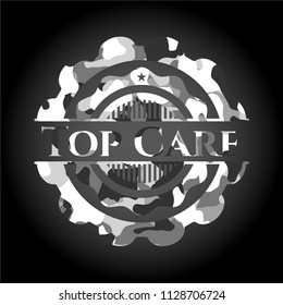 Top Care on grey camo texture